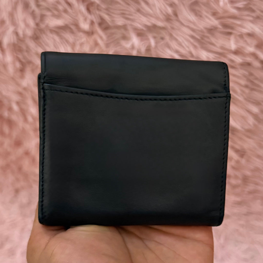 Cartera coach de piel