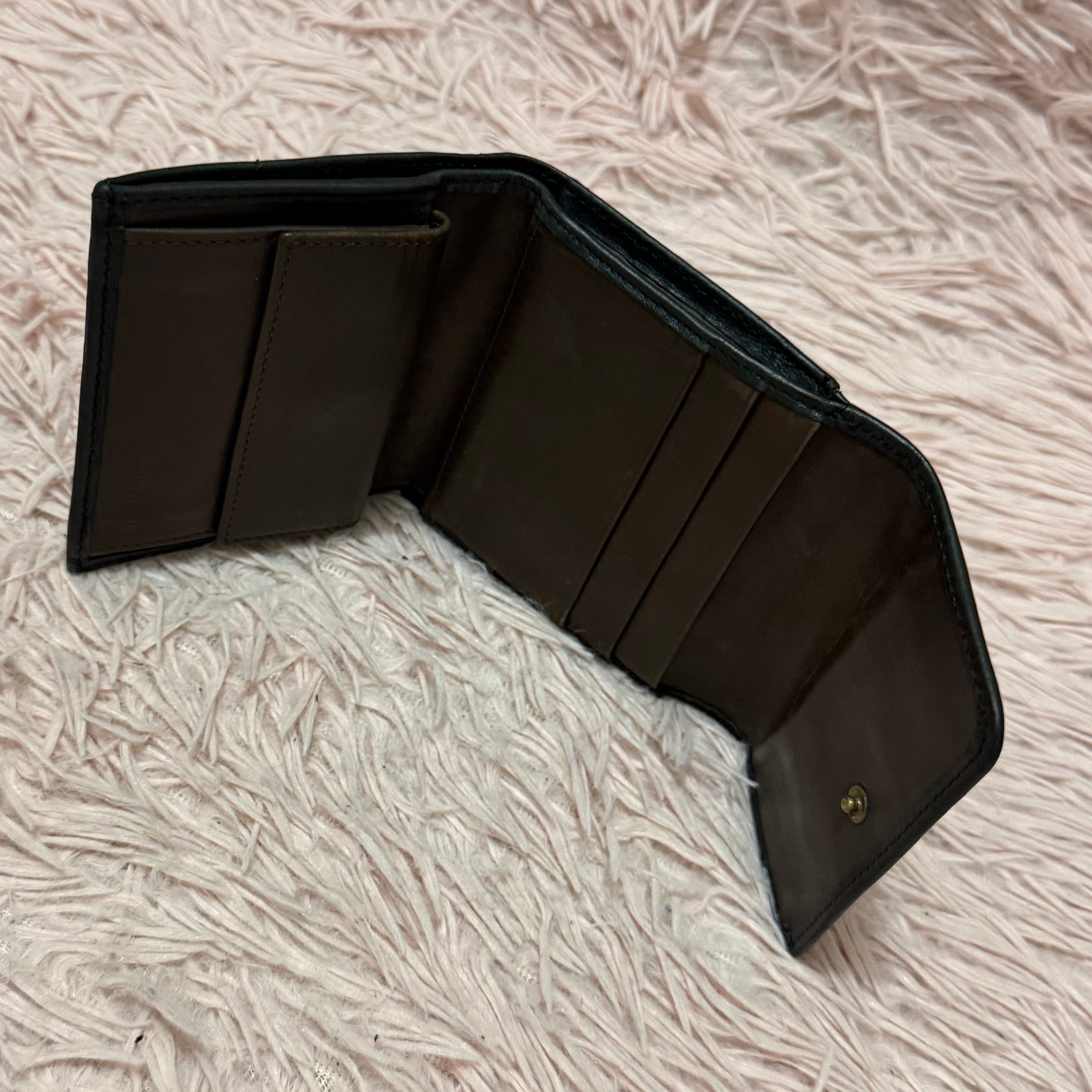 Cartera coach de piel